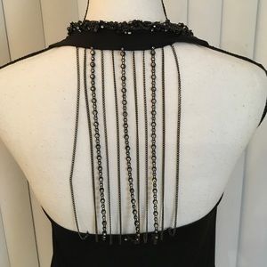 SB Glam,Black halter top with sequences around the neck and decorative back